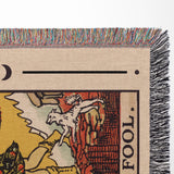 Close-up of a tarot card-style rug with fringed edges