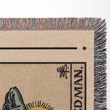 Tarot blanket with colorful fringe, graphic design, and text on a white background