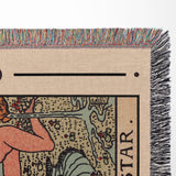 Close-up of a Star tarot blanket with colorful fringe at the top and a detailed design.