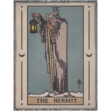 Tarot card blanket featuring 'The Hermit' with a person holding a lantern against a mountainous background.