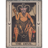 Woven blanket with 'The Devil' tarot card design on a plain background